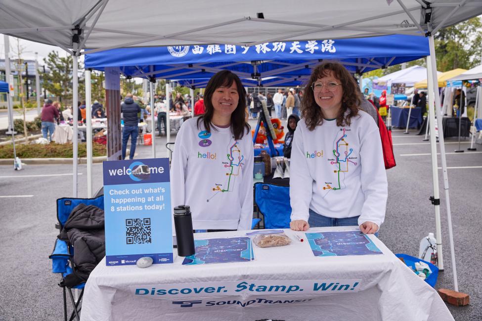 Sound Transit ambassadors table the Discover Stamp Win activity booth