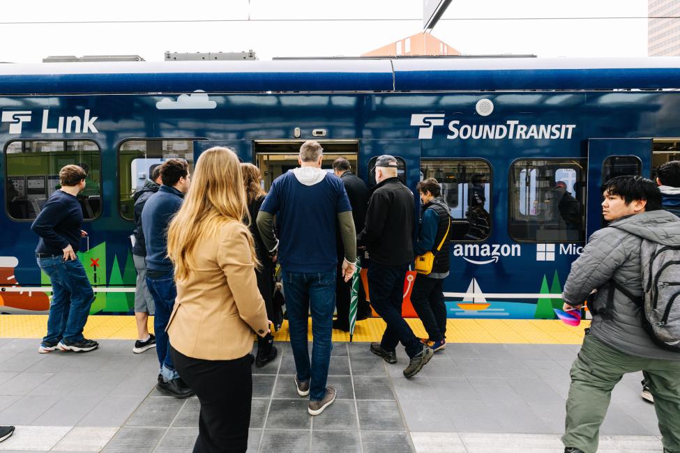 Passengers board the Sound Transit event themed train
