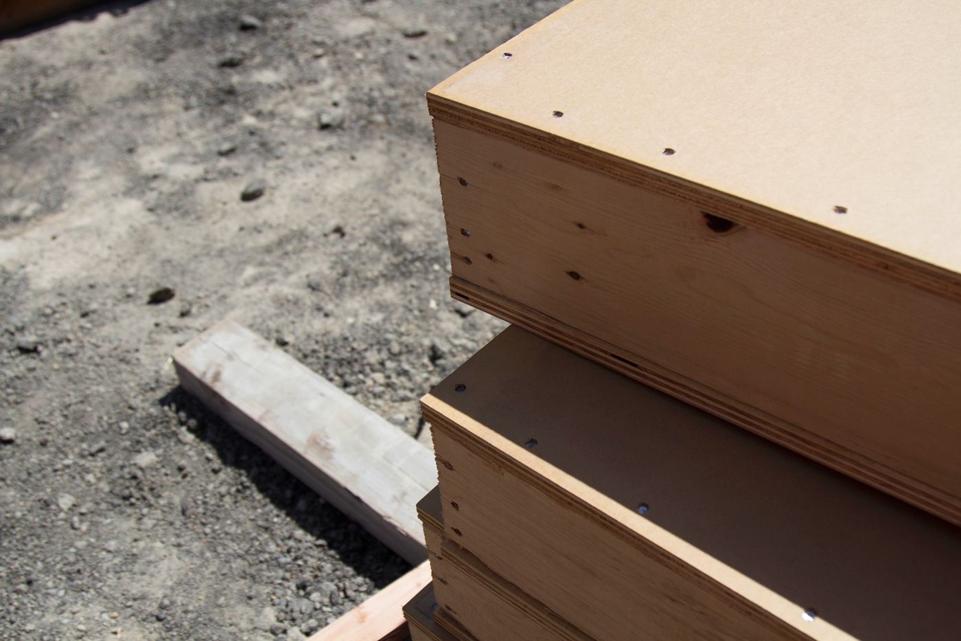Plywood sheets with a sound-mitigating material for the sound wall.