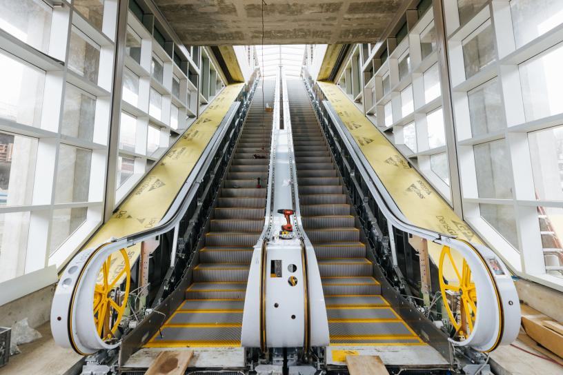 Photo of escalators leading up to the elevated platform at South Bellevue Station.