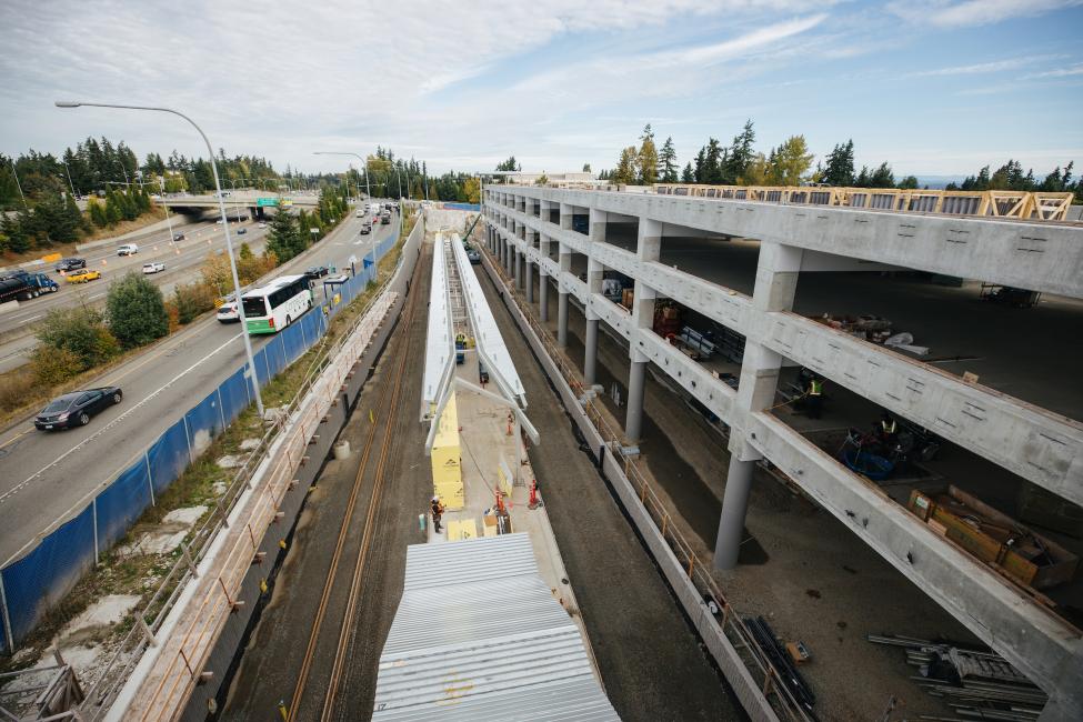 A platform and parking garage are under construction in Redmond, near Microsoft headquarters. SR 520 can be seen on the left side of the photo.