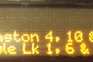 Real-time train arrival information displayed at a Westlake Station sign