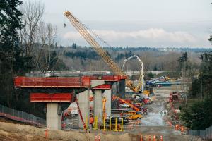 New columns to support light rail tracks to Federal Way rise in SeaTac.