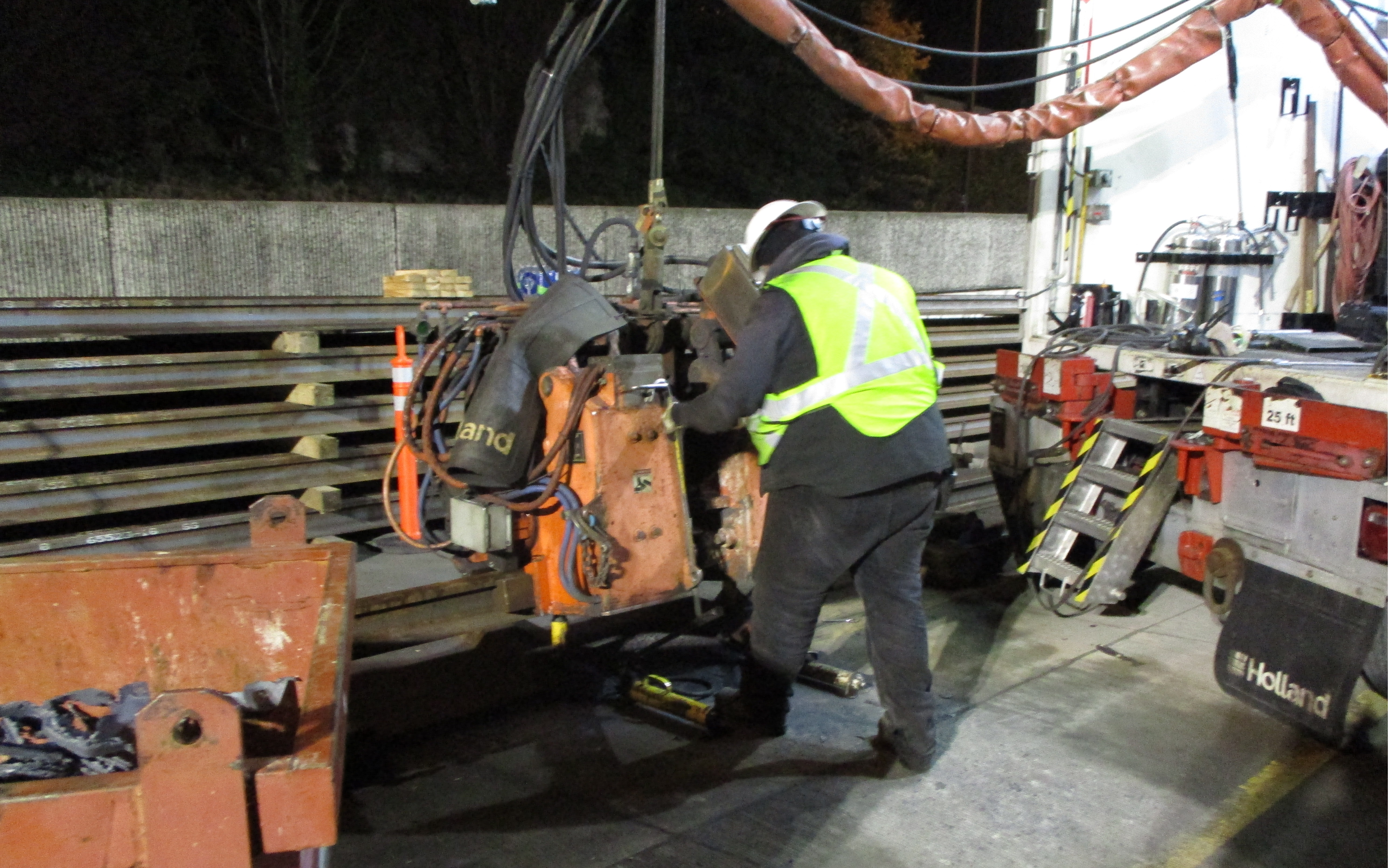 Image of crewmember with welding machine at Judkins Park Station East Link Extension