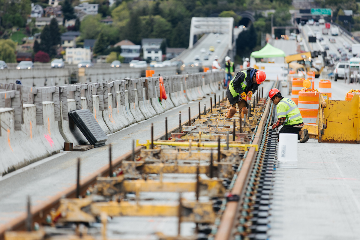 Tracks for link light rail stretch across the I-90 floating bridge.