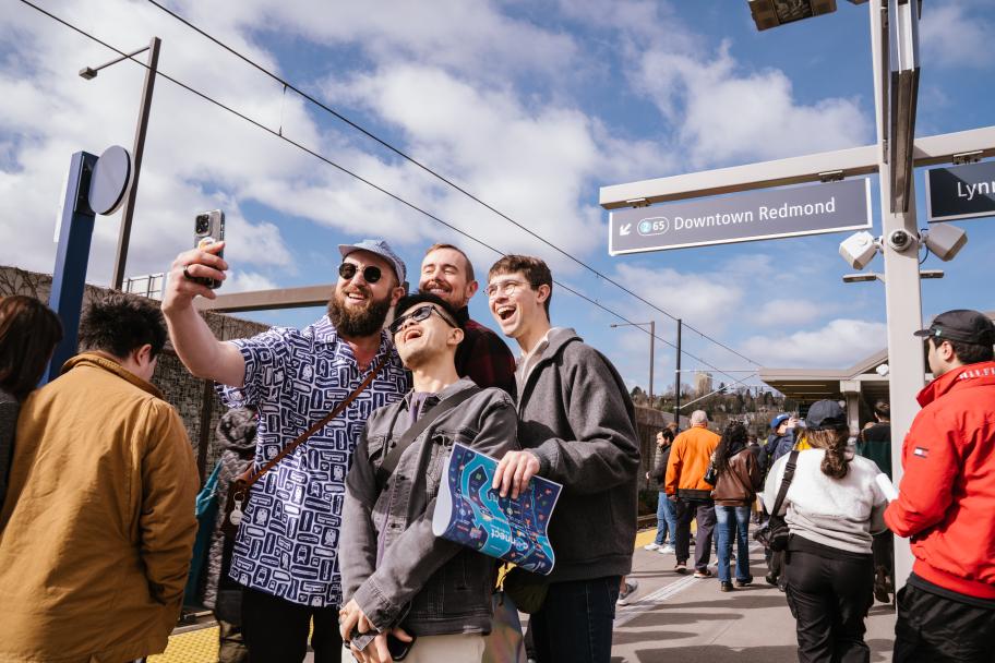 People posing on station platform
