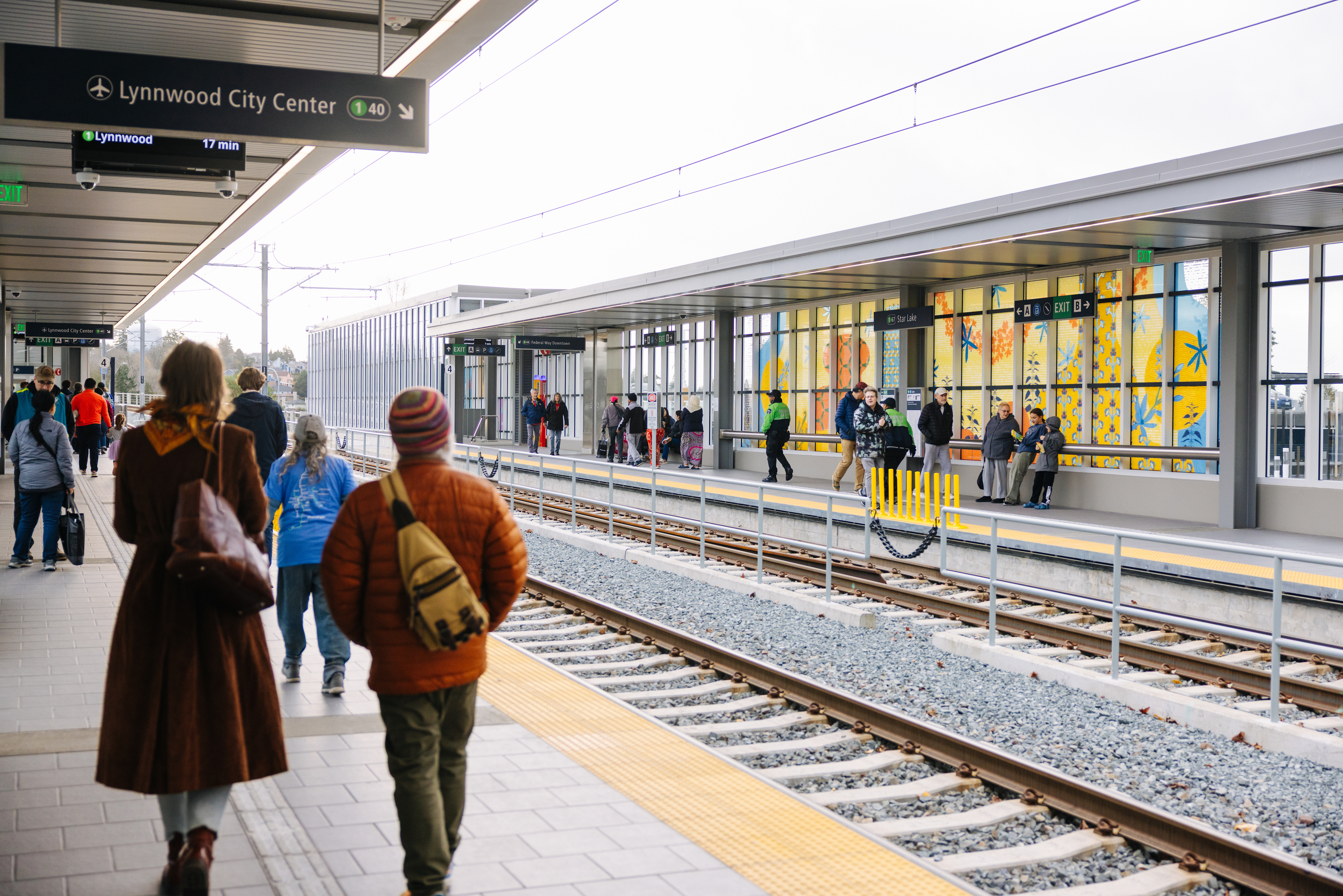 Passengers at Star Lake Station on the platform on the opening day of the Federal Way Link Extension.