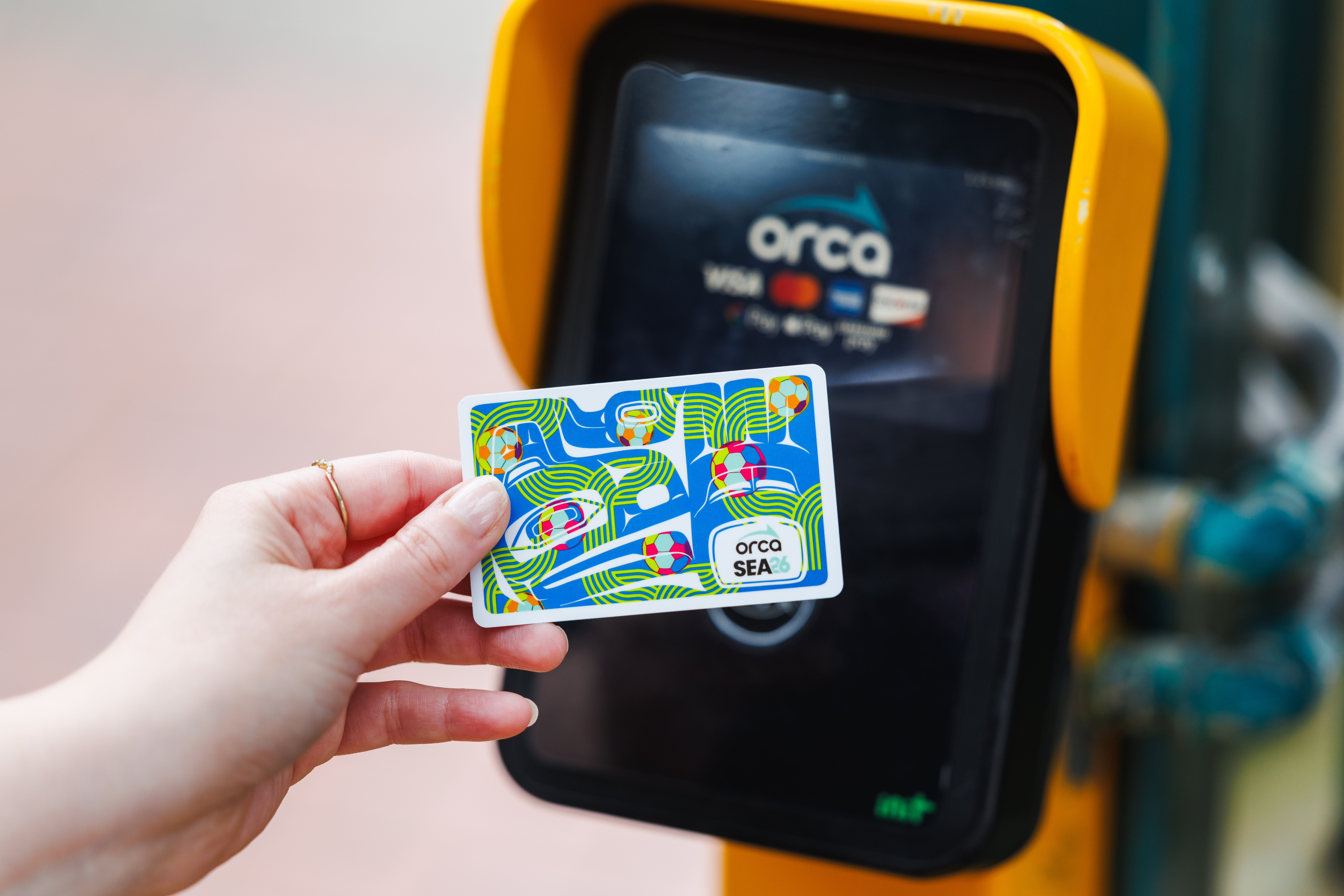 Soccer Tournament branded ORCA card tapping on reader