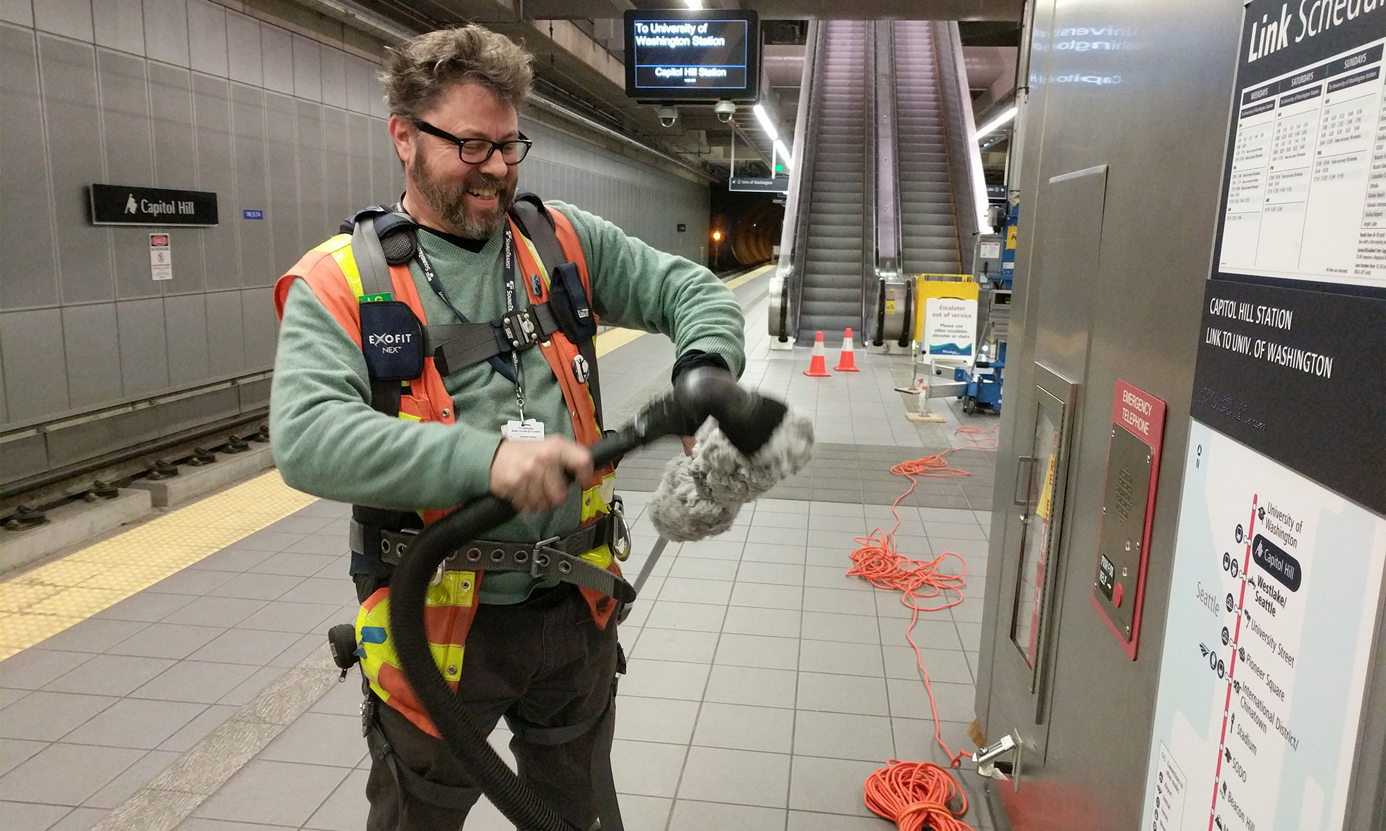 Sound Transit art maintenance man prepares to clean Jet Kiss at Capitol Hill Station
