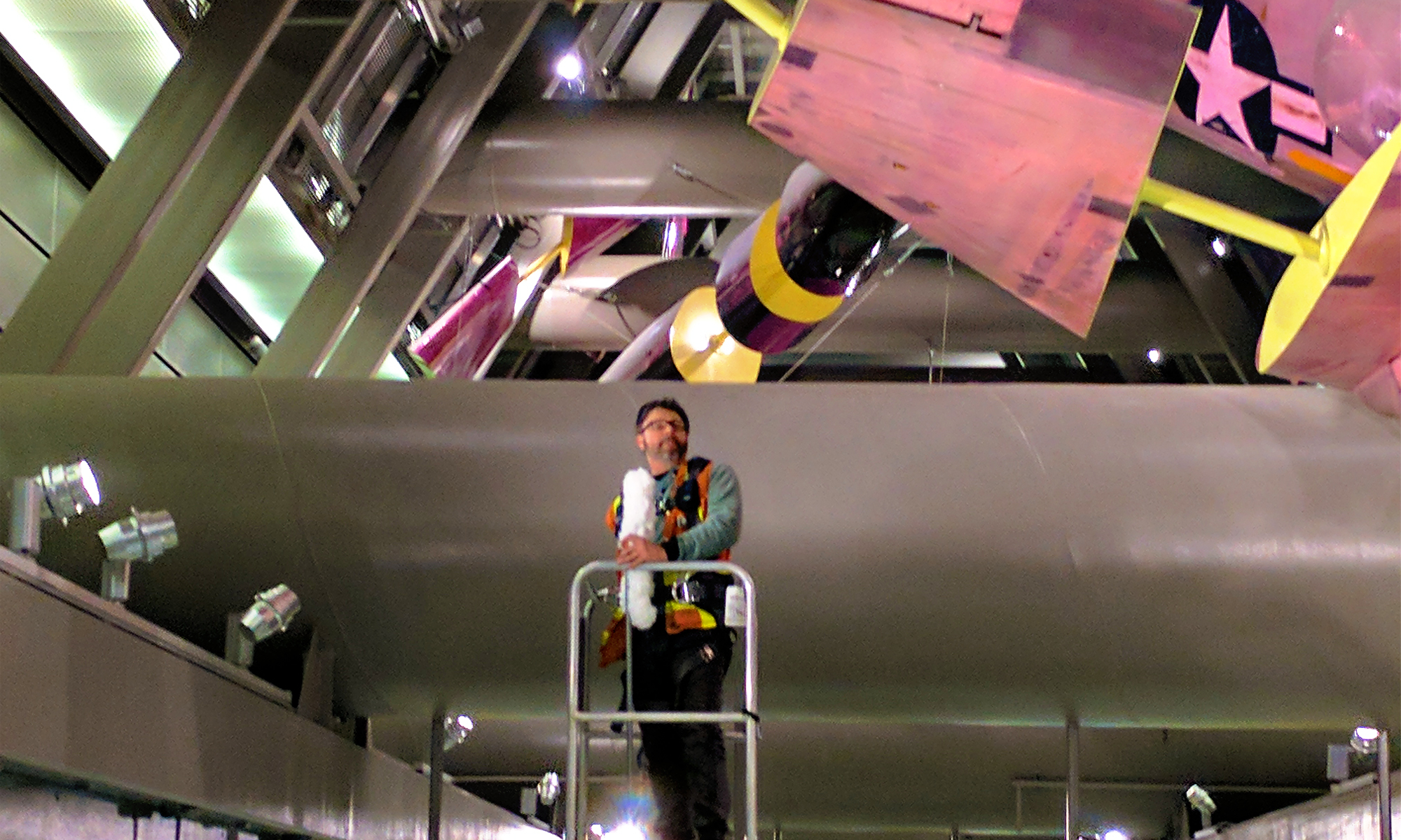 Sound Transit art maintenance man prepares to clean Jet Kiss at Capitol Hill Station