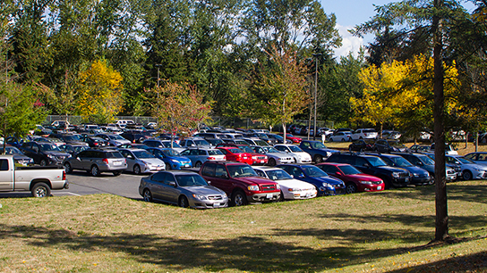 Cars parked at a park and ride.