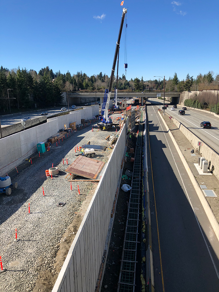 Sound walls on the station's north and south side begin to take shape.