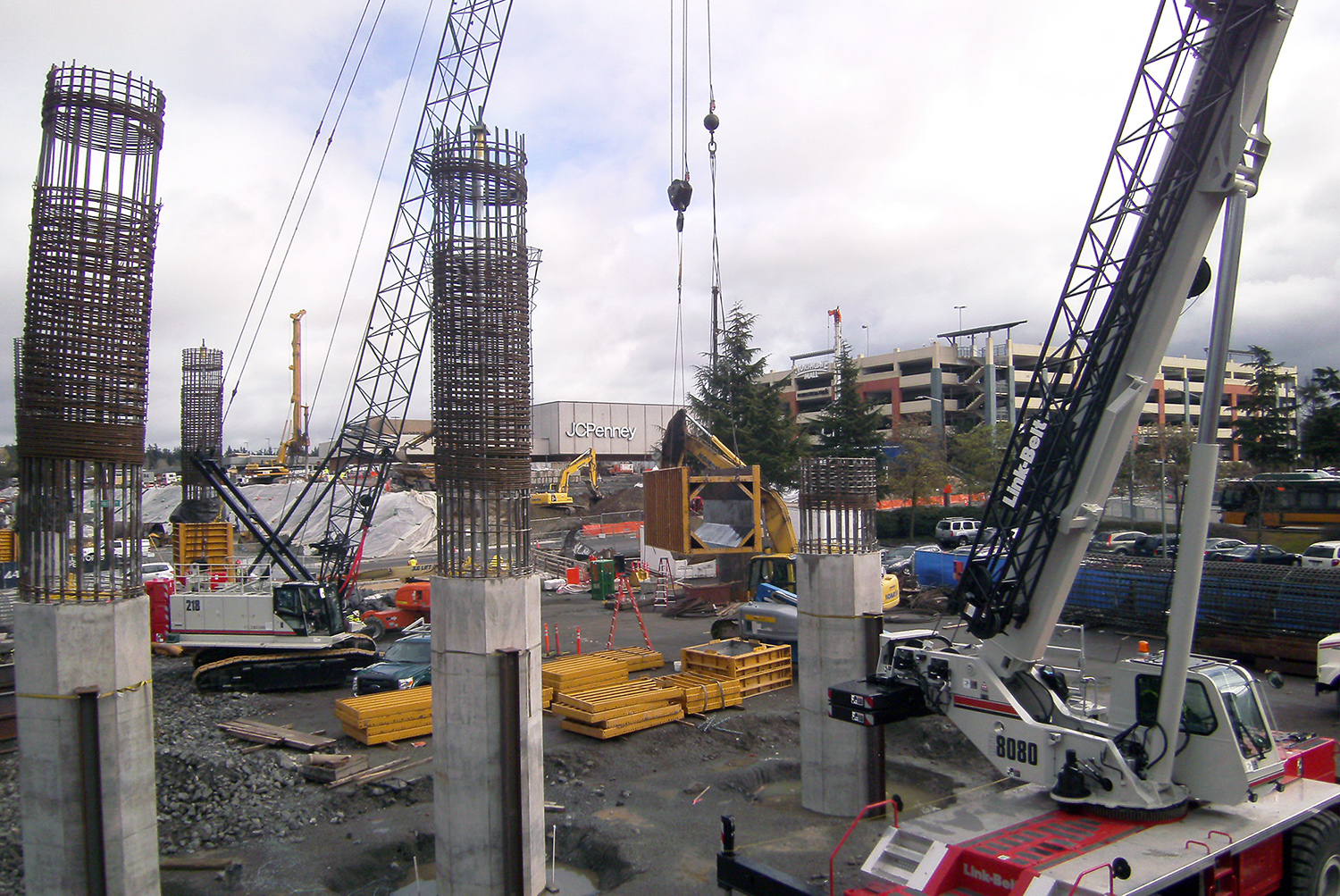 Construction crew installs support columns for the future Northgate Station.