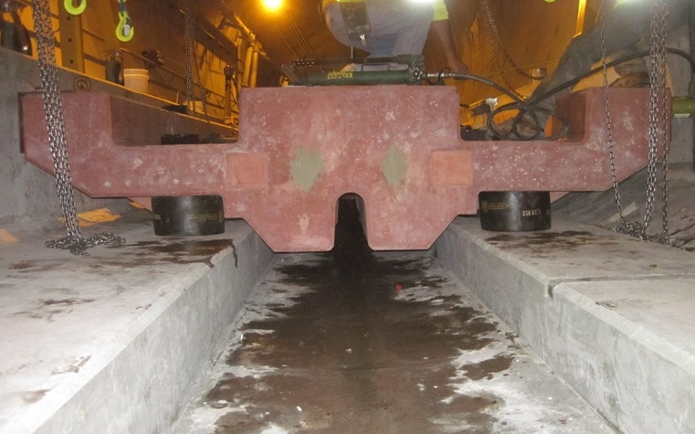 A picture of the special concrete bed, called a "floating slab" that rails will rest on beneath the University of Washington