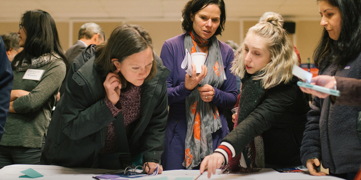 Community members attend a West Seattle and Ballard Link Extension open house.