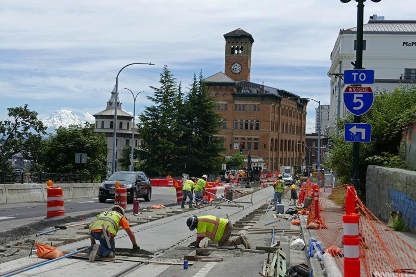 Construction photo of I-705 Track installation and concrete smoothing