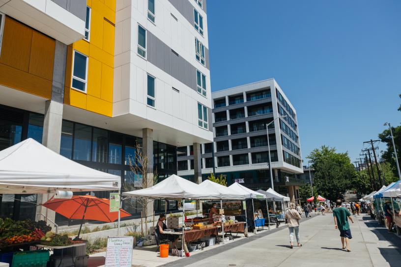 Photo of the Capitol Hill Station Development, a mixed-used building with 428 residential units and space for the Capitol Hill farmer's market, situated near the Capitol Hill light rail station