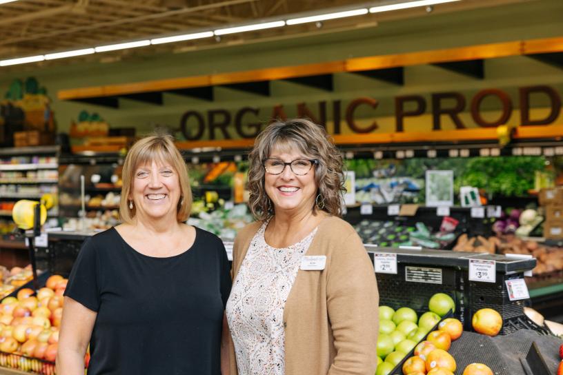 Photo showing the owner of Marlene's Market and Deli with an employee