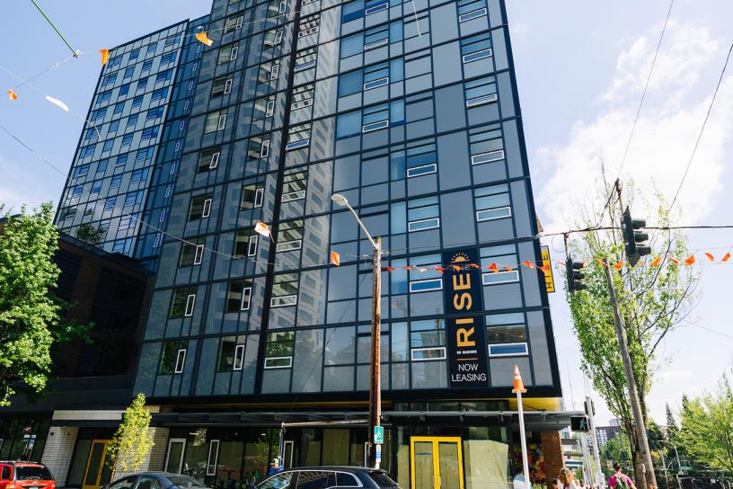 A street-level view of The Blake / Rise buildings in Seattle.