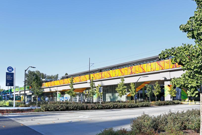 Orange and yellow art at South Bellevue Station, as seen from the street level