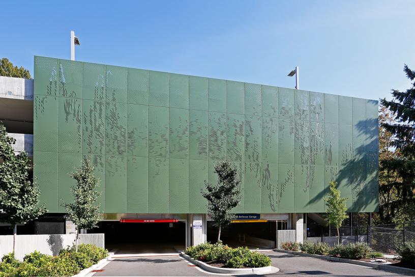 A large piece of green artwork at the South Bellevue garage entrance