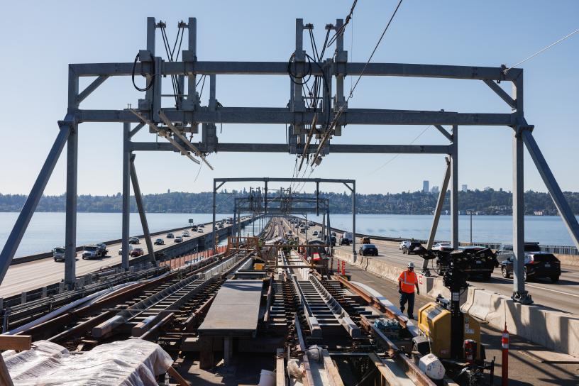 Construction on the overhead wires for light rail trains on the I-90 bridge