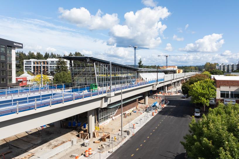 Construction fencing surrounds the almost complete new light rail station in Redmond
