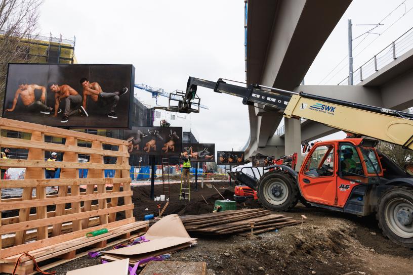 Art showing a person breakdancing, called "Johnny Leggs, Pandemic Portrait Series," is installed in Redmond.