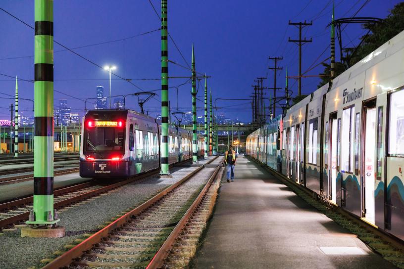 The train yard at OMF Central in Seattle’s SODO neighborhood features artwork called “Safety Spires,” by Norie Sato and Dan Corson. Through color and a simple pattern, Sato and Corson transformed the facility’s overhead catenary system poles into a collection of horsetail reeds. 