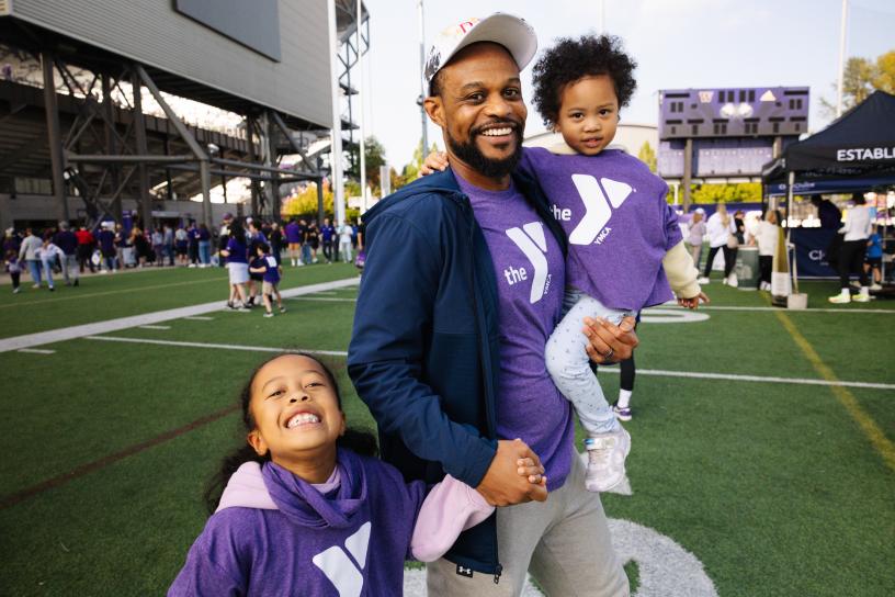 Sound Transit partnered with the Greater Seattle YMCA to bring Y staff and families together for a group ride to the University of Washington Husky football game on September 19