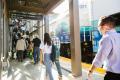 Commuters exit up the stairs of the Mukilteo Sounder Station platform.