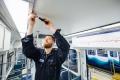 Maintenance performed on Light rail car interior at the Operations and Maintenance Facility in Seattle