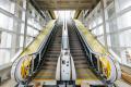 Photo of escalators leading up to the elevated platform at South Bellevue Station.