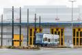 Photo of a link train at a service bay at Operations and Maintenance Facility East