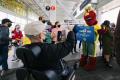 Doppler, the Seattle storm mascot, on a train