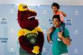 Community members and Seattle Storm mascot "Doppler" at the 2025 Transit Safety Fair.