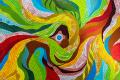 Bright colors - green, red, blue, yellow and more - are used in this mosaic art.