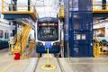 The 160,000-square-foot OMF Central in SODO includes nine service bays, a repair center, and automated wash-bays like an oversized car wash facility. 
