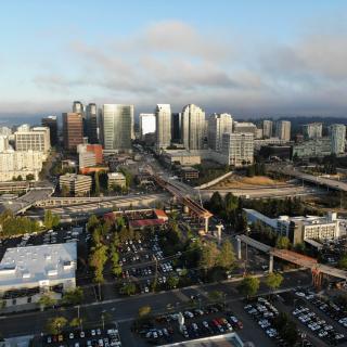 An aerial view of the new East Link light rail bridge crossing I-405 from downtown Bellevue.