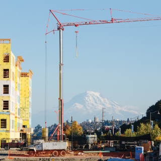 Construction crane with Mount Rainier in the background
