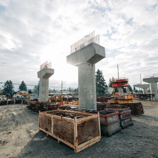 Columns that will support the elevated station platform rise at Kent/Des Moines Station near South 24th Street in Kent. 