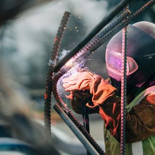 Photo of a worker at Kent Des Moines Station photo, Federal Way Link Extension project update march 2021