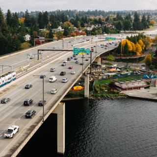 A train is pulled over the bridge between Mercer Island and Bellevue during light rail train testing