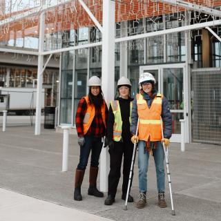 Michelle de la Vega, Chelsea Gaddy, and Ashley Long in front of the finished sculpture