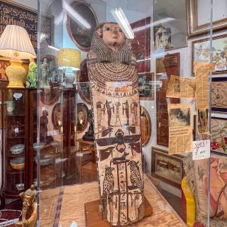 Sarcophagus on display inside Sanford and Son's antique shop
