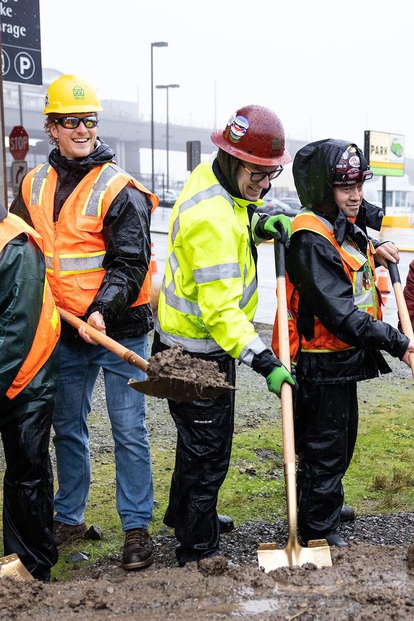 Participants celebrate the groundbreaking at the Angle Lake TOD site.