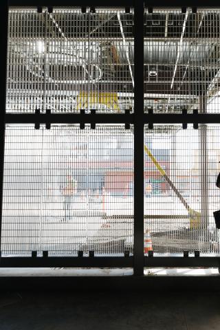 Workers and a Link Light Rail construction site