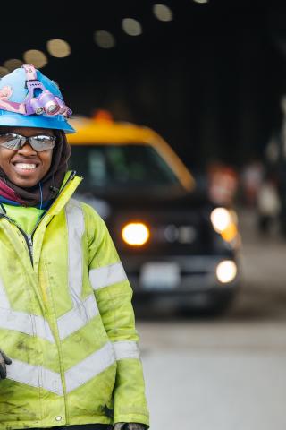 A worker at a construction site along the East Link extension.