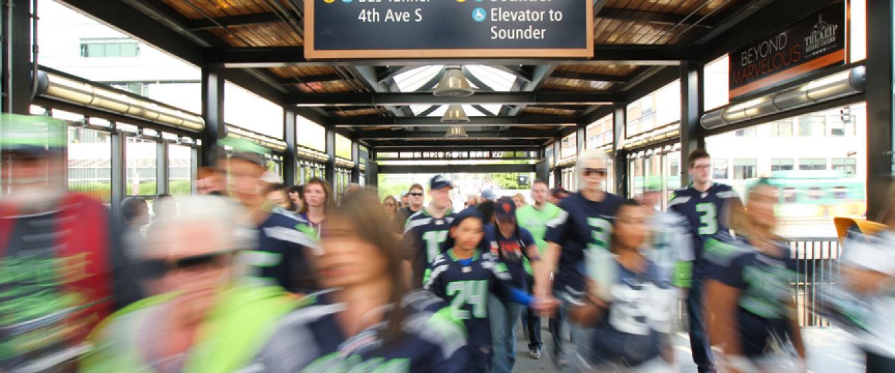 Seahawks fans leave King Street Station, heading to CenturyLink Field.