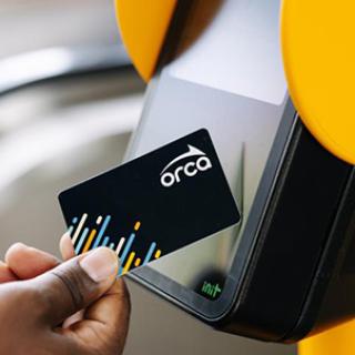 ORCA card next to a ticket reading machine
